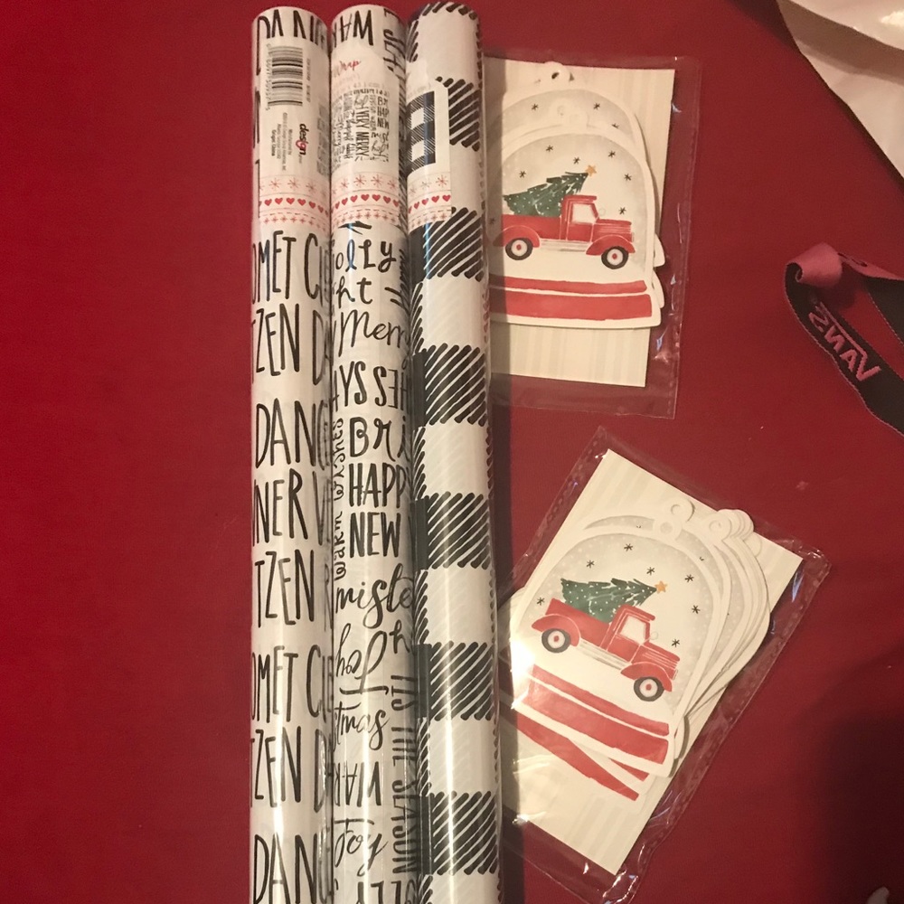 3 wrapping papers and 2 sets of tags